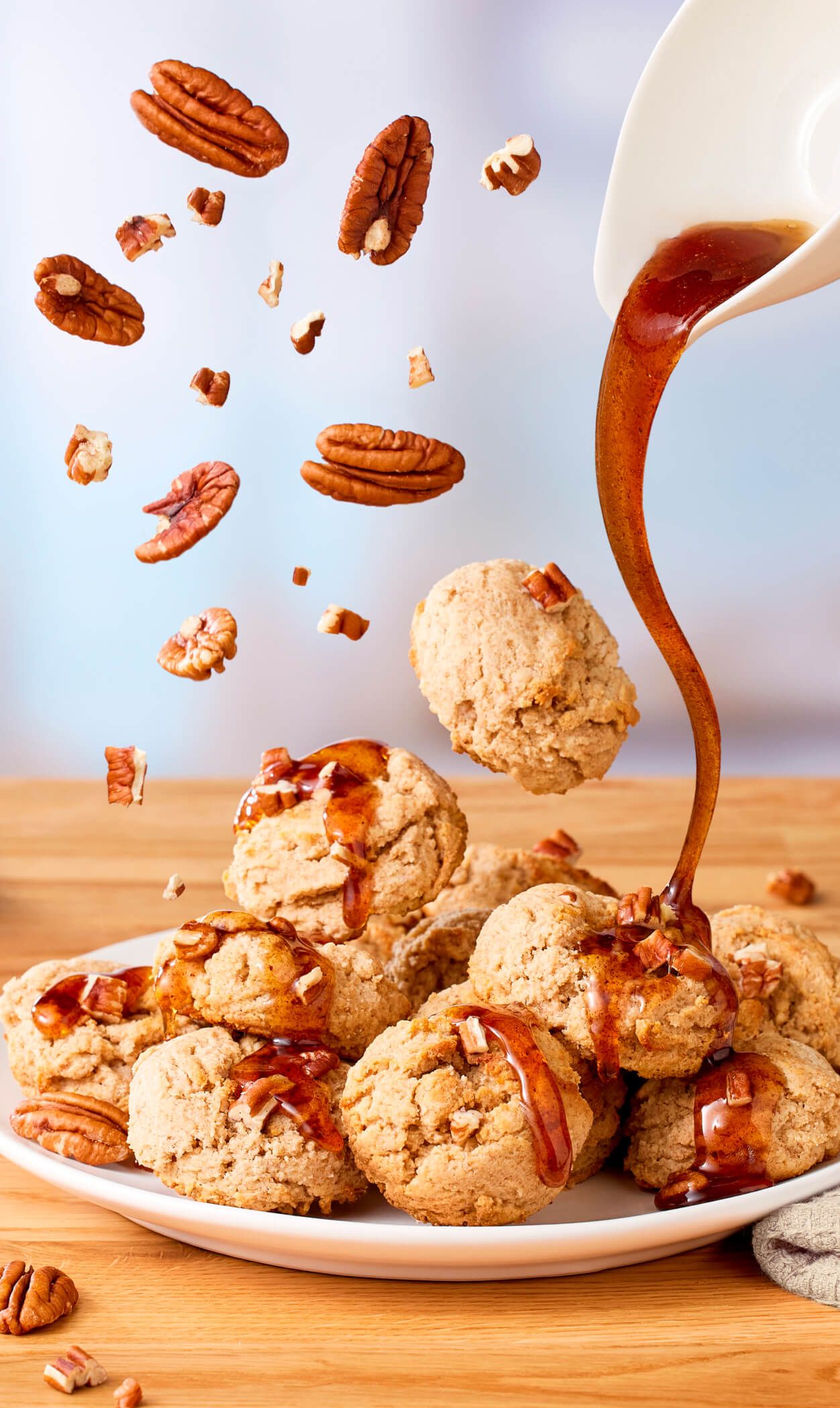 Maple Scone Bites with drizzled Pecan Syrup and nuts.